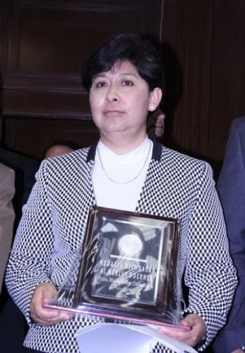 la Medalla Michoacán al Mérito Docente