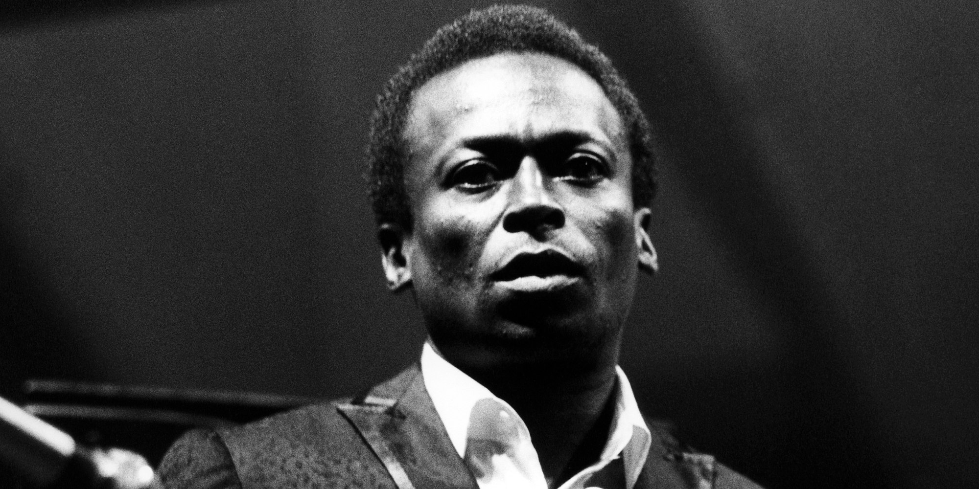 UNITED STATES - JULY 02:  NEWPORT JAZZ FESTIVAL  Photo of Miles DAVIS, Performing live onstage - looking to camera.  (Photo by David Redfern/Redferns)