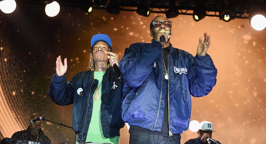 NEW YORK, NY - MAY 03: Wiz Khalifa and Snoop Dog perform onstage at the AOL NewFront 2016 at Seaport District NYC on May 3, 2016 in New York City. (Photo by Jamie McCarthy/Getty Images for AOL)