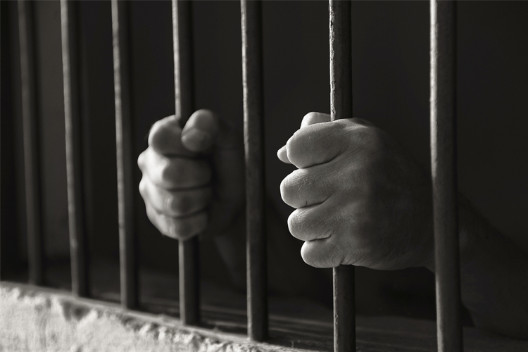 Cárcel-Detenido