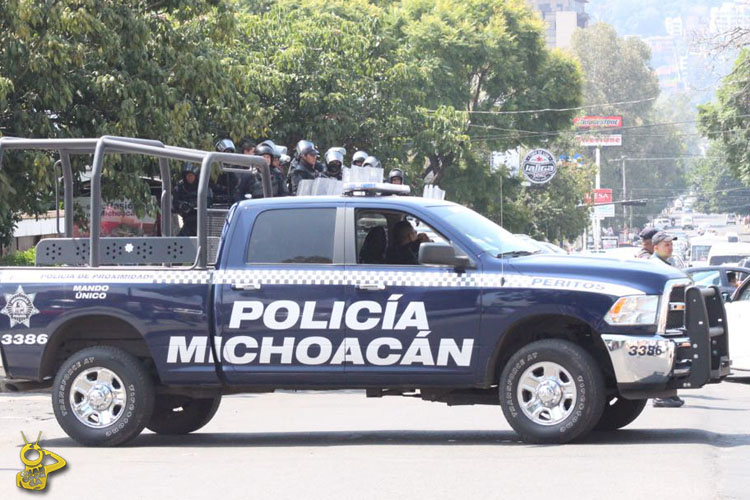 policía mich 1 bloqueo estudiantes