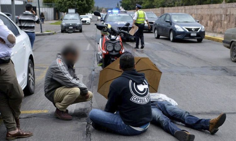 motociclista baches Morelia lesionados patrulla