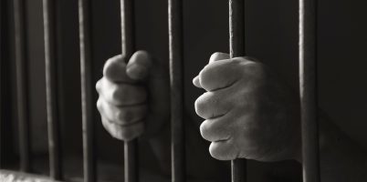 Cárcel-Detenido